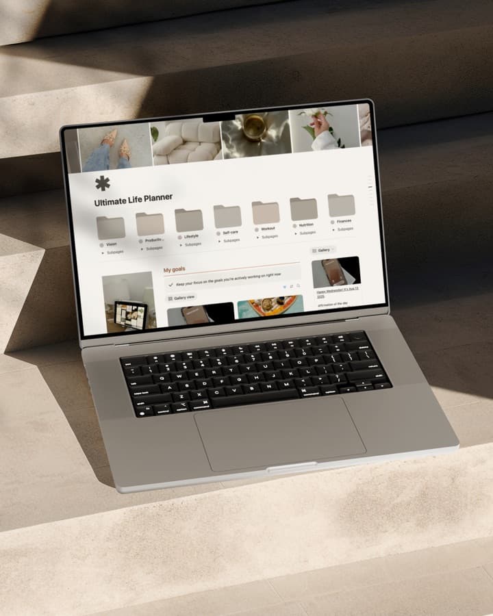 The ultimate life planner open on a laptop